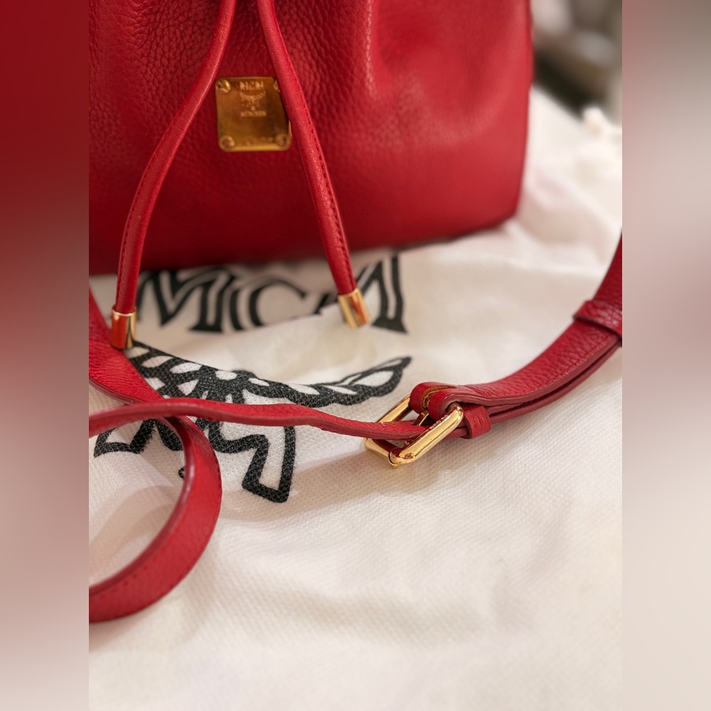 MCM Red Leather Bucket Bag
Crossbody Drawstring Gold Hardware - Picture 5 of 17